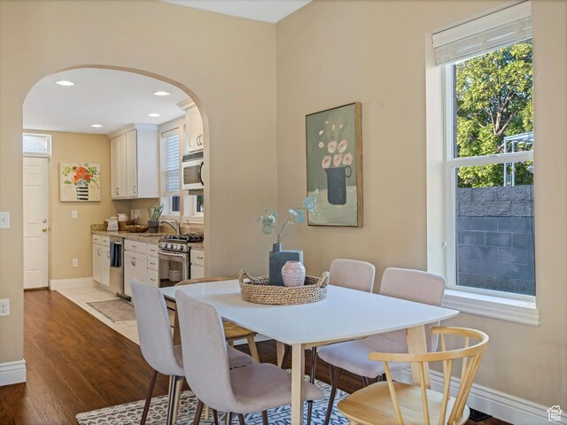 932 W 600 N, Salt Lake City, UT 84116 - dining room with arched walkways, baseboards, wood finished floors, and recessed lighting