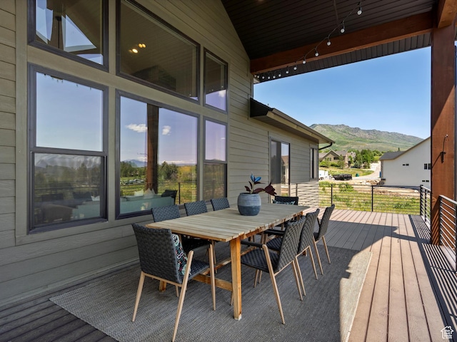 4021 E 4325 N, Eden, UT 84310 - wooden terrace featuring a mountain view and outdoor dining area