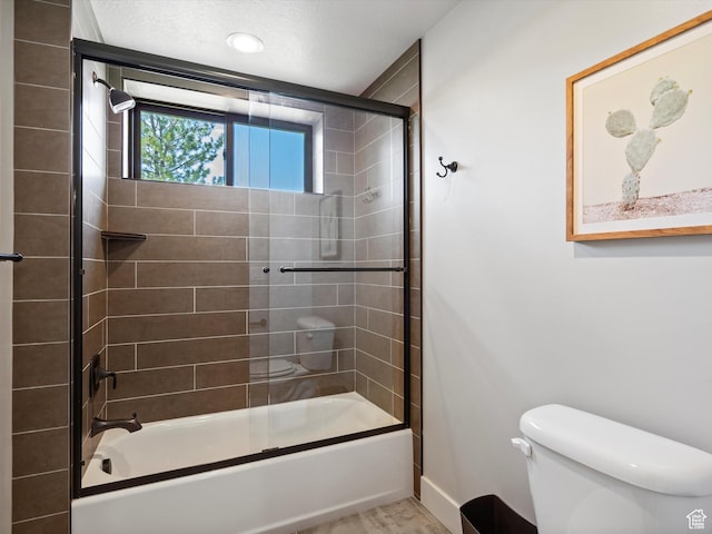 4021 E 4325 N, Eden, UT 84310 - bathroom with toilet, enclosed tub / shower combo, and baseboards