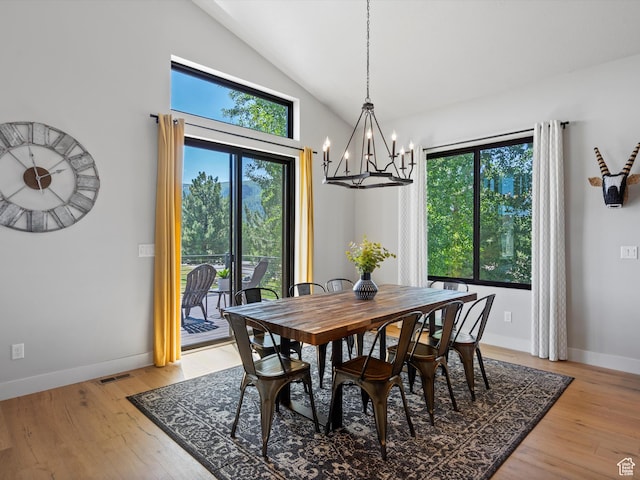 4021 E 4325 N, Eden, UT 84310 - dining area with a chandelier, healthy amount of natural light, light wood-style flooring, baseboards, and high vaulted ceiling