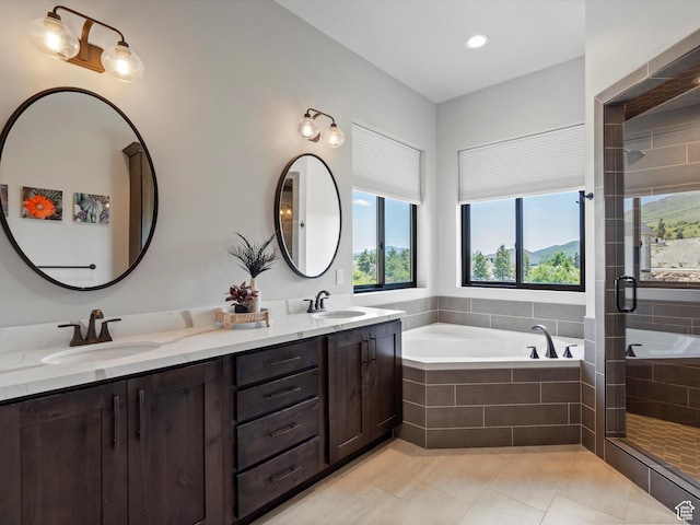 4021 E 4325 N, Eden, UT 84310 - full bathroom with a garden tub, a stall shower, double vanity, and tile patterned floors