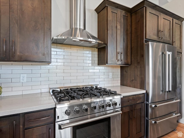 4021 E 4325 N, Eden, UT 84310 - kitchen with high quality appliances, wall chimney range hood, dark brown cabinets, and light countertops