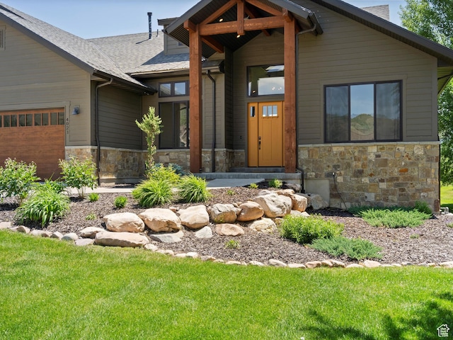 4021 E 4325 N, Eden, UT 84310 - view of front of home featuring stone siding, a garage, a shingled roof, and a front yard