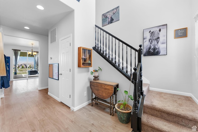 227 E Sandhill Dr, Saratoga Springs, UT 84045 - stairway with a chandelier, baseboards, recessed lighting, and wood finished floors