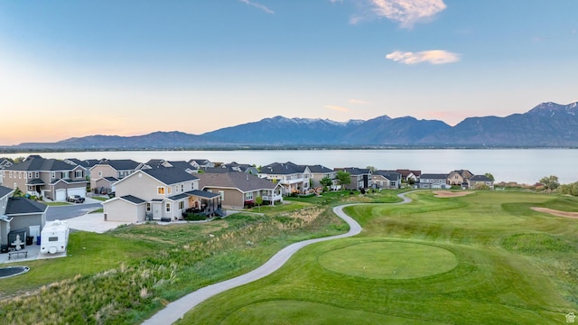 227 E Sandhill Dr, Saratoga Springs, UT 84045 - aerial view at dusk of a residential view, a water and mountain view, and view of golf course