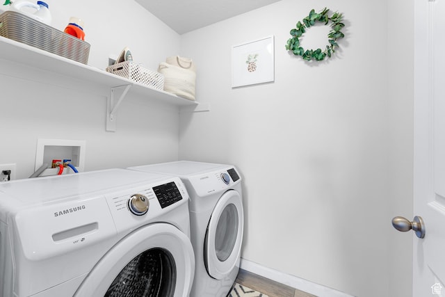 227 E Sandhill Dr, Saratoga Springs, UT 84045 - laundry room featuring independent washer and dryer, light wood-style floors, and baseboards