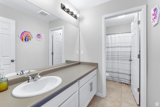 227 E Sandhill Dr, Saratoga Springs, UT 84045 - full bathroom featuring vanity, toilet, tile patterned floors, and a shower with curtain
