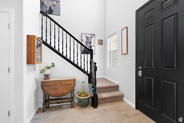 227 E Sandhill Dr, Saratoga Springs, UT 84045 - entrance foyer featuring wood finished floors, baseboards, and stairway