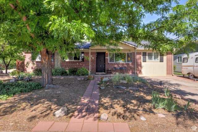 279 Park Rd, Moab, UT 84532 - view of front facade featuring brick siding