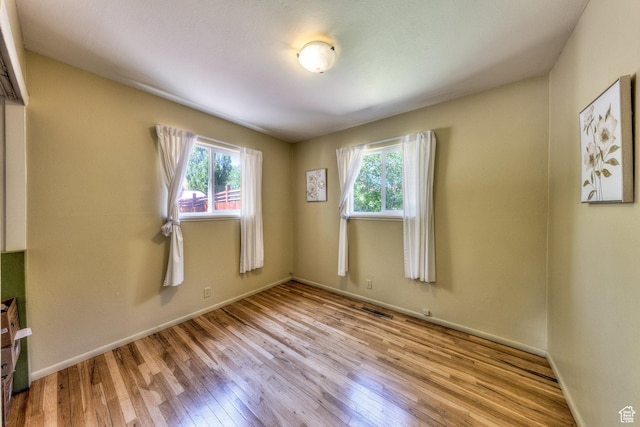 279 Park Rd, Moab, UT 84532 - spare room with hardwood / wood-style floors and baseboards