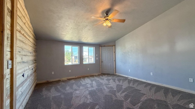 121 2nd W, East Carbon, UT 84520 - spare room featuring carpet floors, ceiling fan, a textured ceiling, and vaulted ceiling