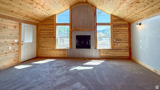 121 2nd W, East Carbon, UT 84520 - unfurnished living room featuring wooden walls, vaulted ceiling, carpet flooring, and wood ceiling