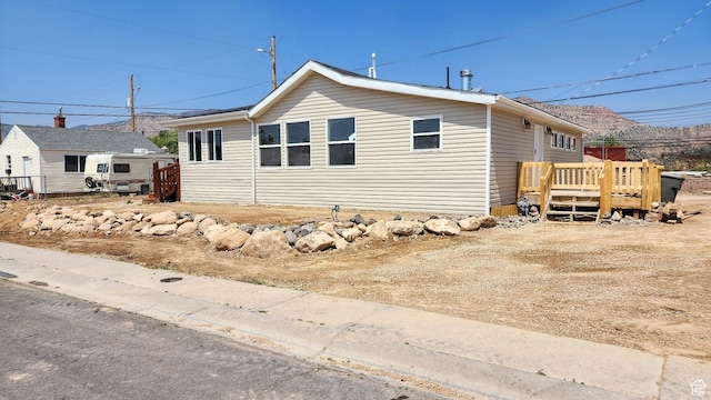 121 2nd W, East Carbon, UT 84520 - view of side of home featuring a deck