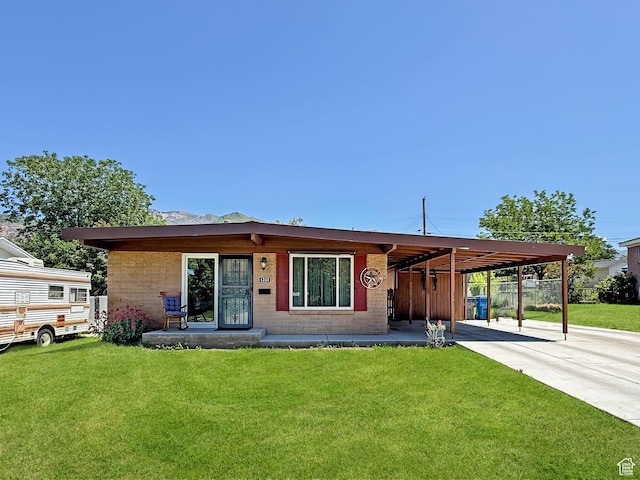 4350 S 850 E, South Ogden, UT 84403 - view of front of property featuring a carport and concrete driveway