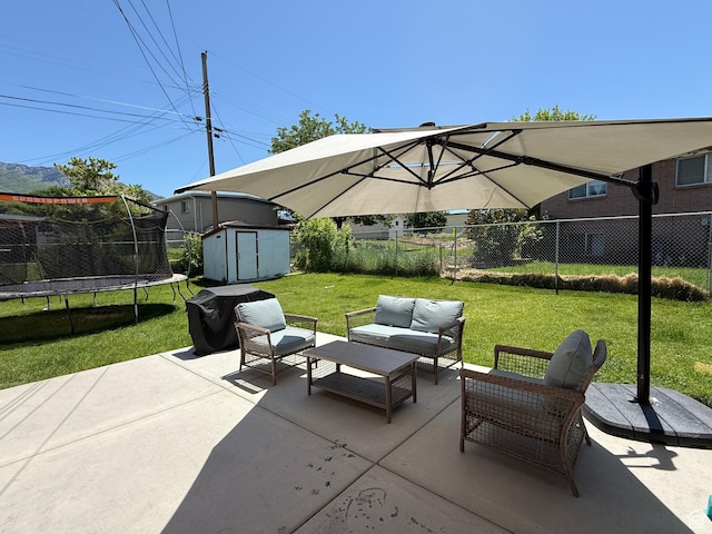 4350 S 850 E, South Ogden, UT 84403 - view of patio / terrace with a trampoline and an outdoor living space