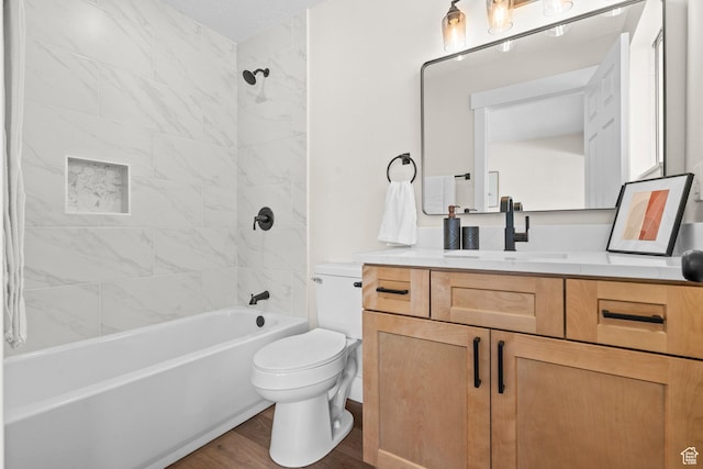 2139 N 300 W, Lehi, UT 84043 - bathroom featuring toilet, vanity,  shower combination, and wood finished floors