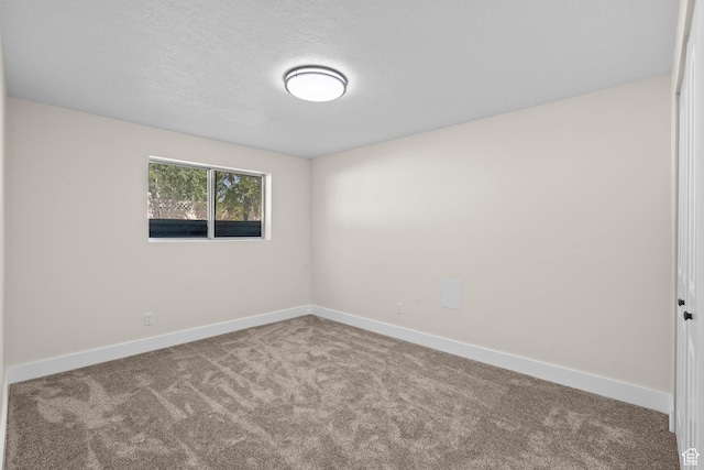 2139 N 300 W, Lehi, UT 84043 - unfurnished room with carpet flooring, baseboards, and a textured ceiling