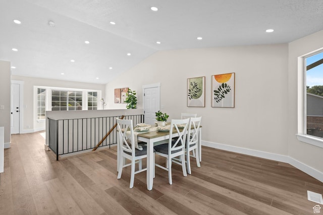 2139 N 300 W, Lehi, UT 84043 - dining space with baseboards, wood finished floors, vaulted ceiling, and recessed lighting