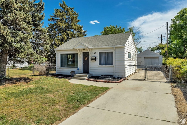 232 E 5900 S, Murray, UT 84107 - bungalow-style home featuring a gate, a detached garage, a shingled roof, and an outbuilding