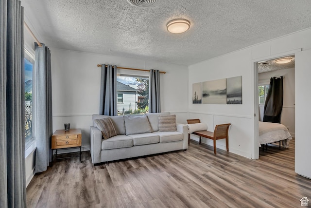 232 E 5900 S, Murray, UT 84107 - living area featuring wood finished floors and a textured ceiling