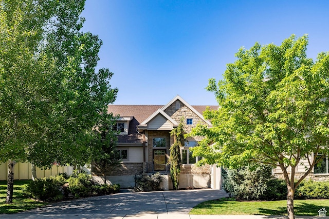5865 Belmont Dr, Mountain Green, UT 84050 - view of front of property with stone siding and driveway