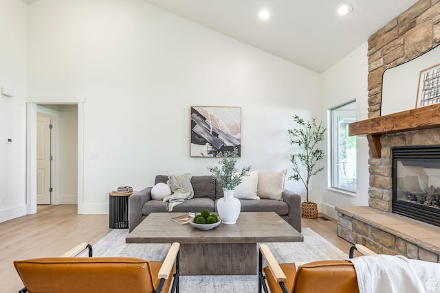5865 Belmont Dr, Mountain Green, UT 84050 - living area featuring high vaulted ceiling, light wood-style floors, a fireplace, baseboards, and recessed lighting