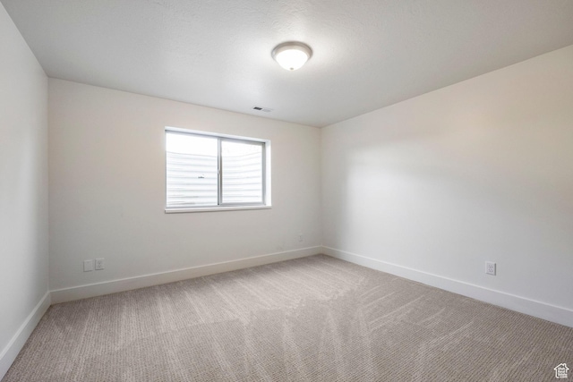 5865 Belmont Dr, Mountain Green, UT 84050 - spare room with light carpet and baseboards
