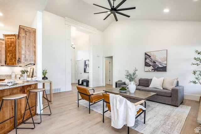 5865 Belmont Dr, Mountain Green, UT 84050 - living room featuring a ceiling fan, light wood finished floors, baseboards, recessed lighting, and high vaulted ceiling