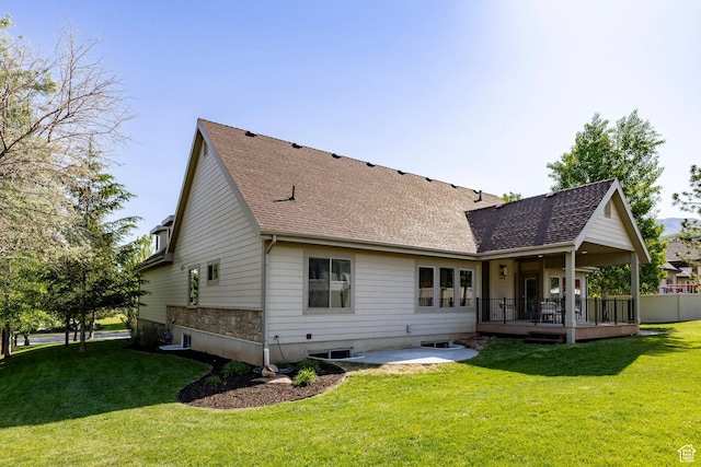 5865 Belmont Dr, Mountain Green, UT 84050 - back of house with a patio, a lawn, and a shingled roof