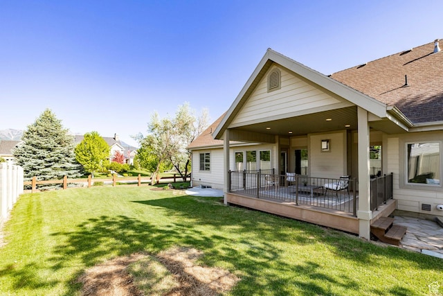 5865 Belmont Dr, Mountain Green, UT 84050 - back of property with a shingled roof and a patio