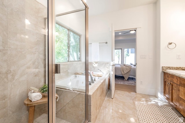 5865 Belmont Dr, Mountain Green, UT 84050 - ensuite bathroom with vanity, a bath, and a stall shower