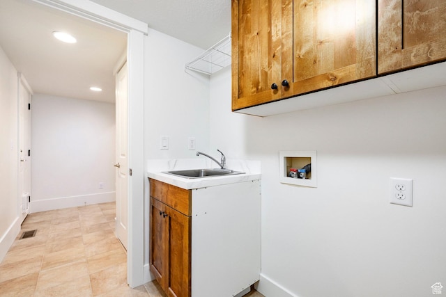 5865 Belmont Dr, Mountain Green, UT 84050 - laundry area with washer hookup, cabinet space, baseboards, and recessed lighting