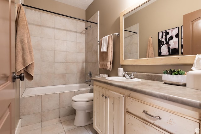 13966 S Arrow Creek Dr E, Draper, UT 84020 - bathroom featuring tile patterned floors, toilet, vanity, and tiled shower / bath