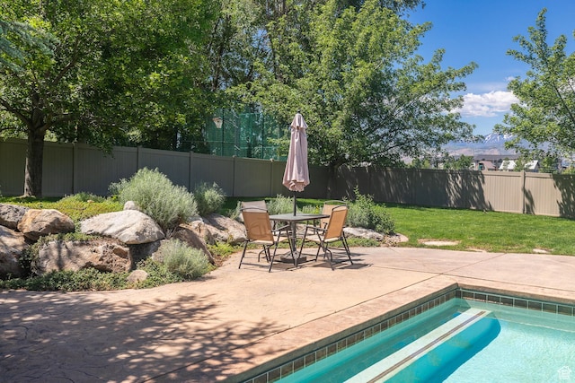13966 S Arrow Creek Dr E, Draper, UT 84020 - view of swimming pool featuring a patio and outdoor dining space