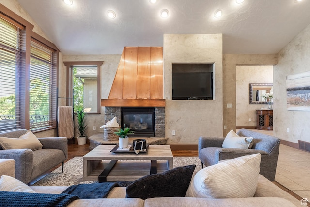 13966 S Arrow Creek Dr E, Draper, UT 84020 - living room featuring a stone fireplace, recessed lighting, and vaulted ceiling