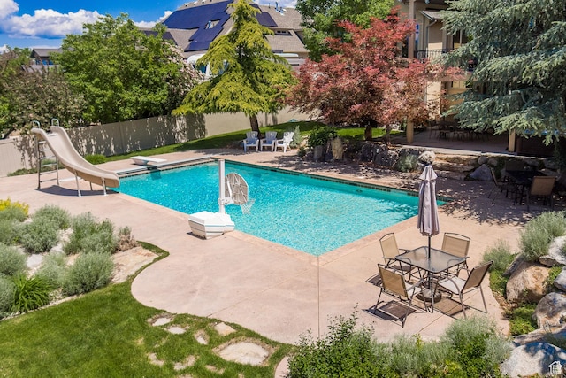 13966 S Arrow Creek Dr E, Draper, UT 84020 - view of swimming pool featuring a patio area and a water slide