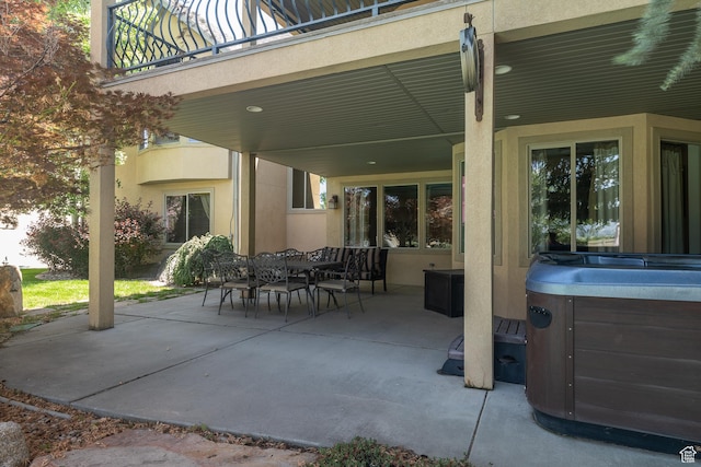 13966 S Arrow Creek Dr E, Draper, UT 84020 - view of patio featuring a hot tub, a balcony, and outdoor dining area