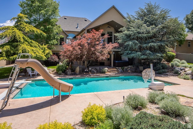13966 S Arrow Creek Dr E, Draper, UT 84020 - swimming pool featuring a water slide, a patio area, and a diving board