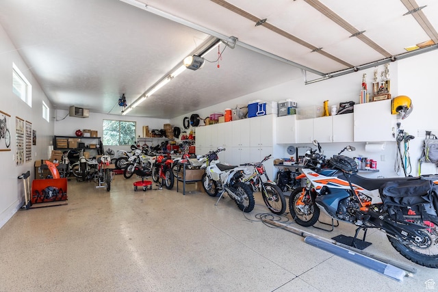 13966 S Arrow Creek Dr E, Draper, UT 84020 - garage featuring a garage door opener