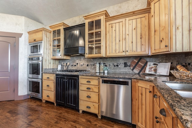 13966 S Arrow Creek Dr E, Draper, UT 84020 - kitchen featuring appliances with stainless steel finishes, dark wood-style flooring, backsplash, premium range hood, and glass insert cabinets