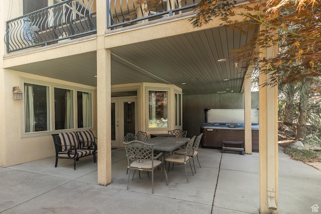 13966 S Arrow Creek Dr E, Draper, UT 84020 - view of patio / terrace with a hot tub, french doors, a balcony, and outdoor dining space