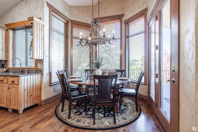 13966 S Arrow Creek Dr E, Draper, UT 84020 - dining room with wood finished floors, a chandelier, and baseboards