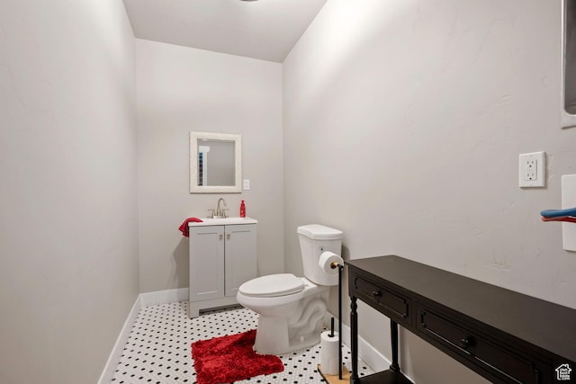 14982 S Aurora Vista Dr W, Herriman, UT 84096 - bathroom featuring baseboards, toilet, vanity, and tile patterned floors