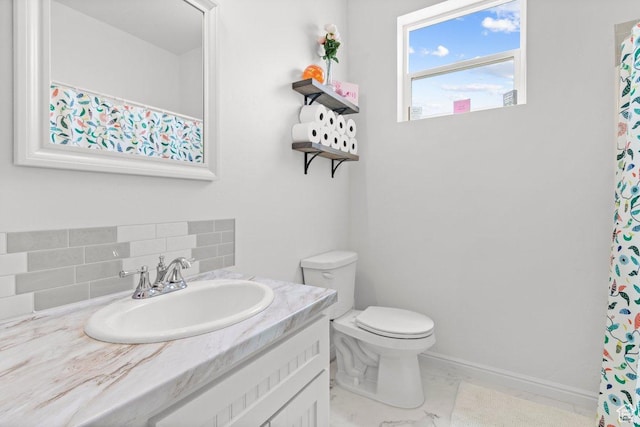 687 E 200 S, Spring City, UT 84662 - full bathroom featuring toilet, vanity, tasteful backsplash, marble finish floors, and baseboards