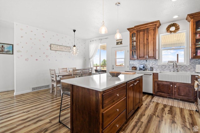 687 E 200 S, Spring City, UT 84662 - kitchen with dishwasher, a sink, light wood finished floors, and healthy amount of natural light