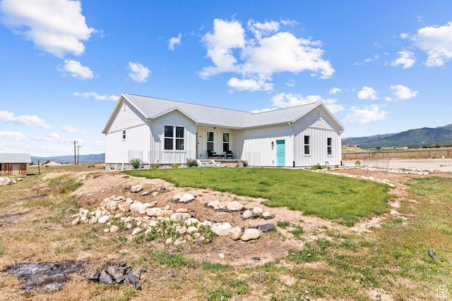 687 E 200 S, Spring City, UT 84662 - rear view of property featuring board and batten siding, a yard, and a mountain view