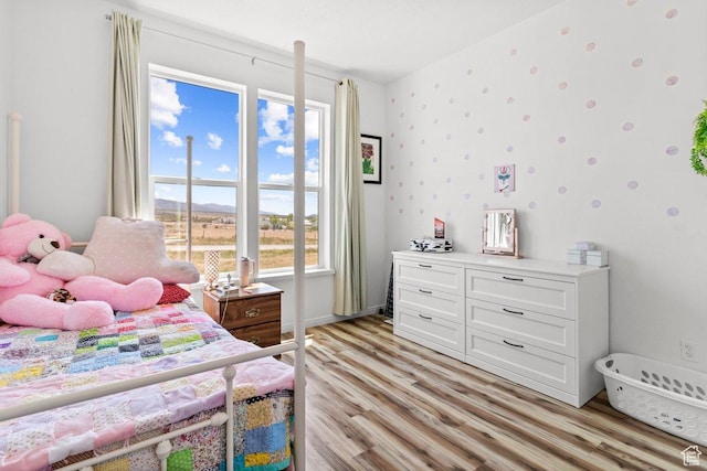 687 E 200 S, Spring City, UT 84662 - bedroom with light wood-style floors, baseboards, and wallpapered walls
