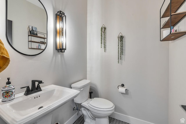 1485 W 1930 N, Pleasant Grove, UT 84062 - half bathroom with toilet, a sink, baseboards, and tile patterned flooring