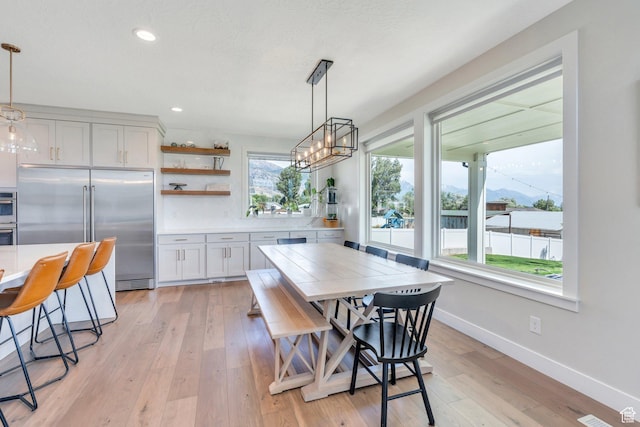 1485 W 1930 N, Pleasant Grove, UT 84062 - dining space featuring baseboards, light wood-style floors, recessed lighting, and a chandelier