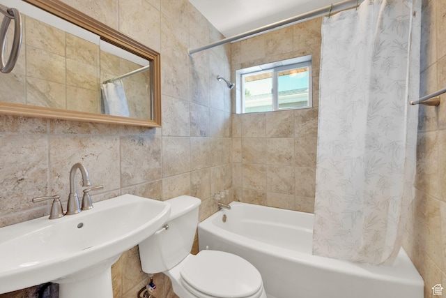 2864 N 175 E, Provo, UT 84604 - bathroom featuring tile walls, a sink, shower / bath combo, and toilet